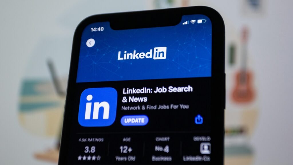 pexels-photo-15406295-15406295 Close-up image of the LinkedIn app update screen on a smartphone display.